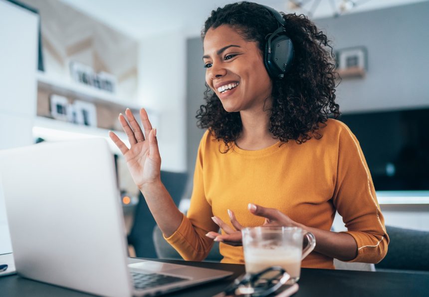 Woman working from home on a video conference call