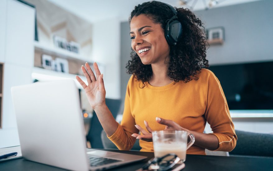 Woman working from home on a video conference call