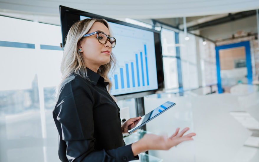 woman holding tablet in the digital workplace